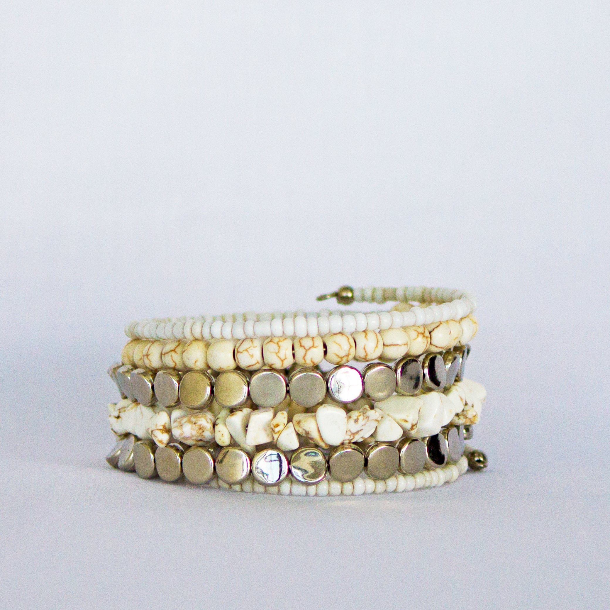 Elegance's White Bead Bangle